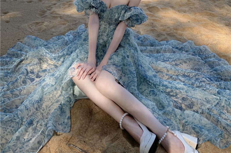Odestra - Maxi A-lijn jurk met pofmouwen en off-shoulder bloemenprint