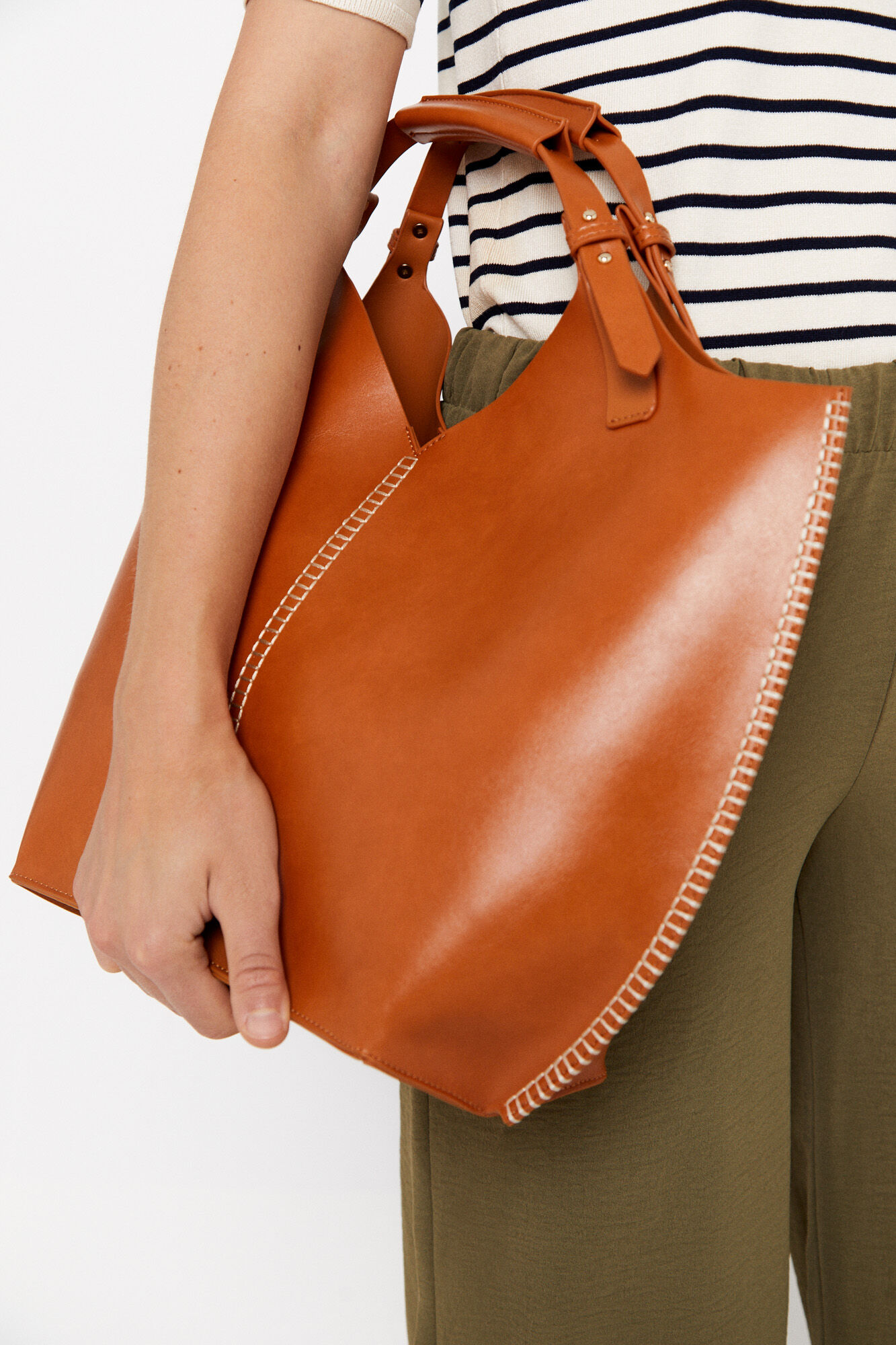 Bolsa de ombro com costura