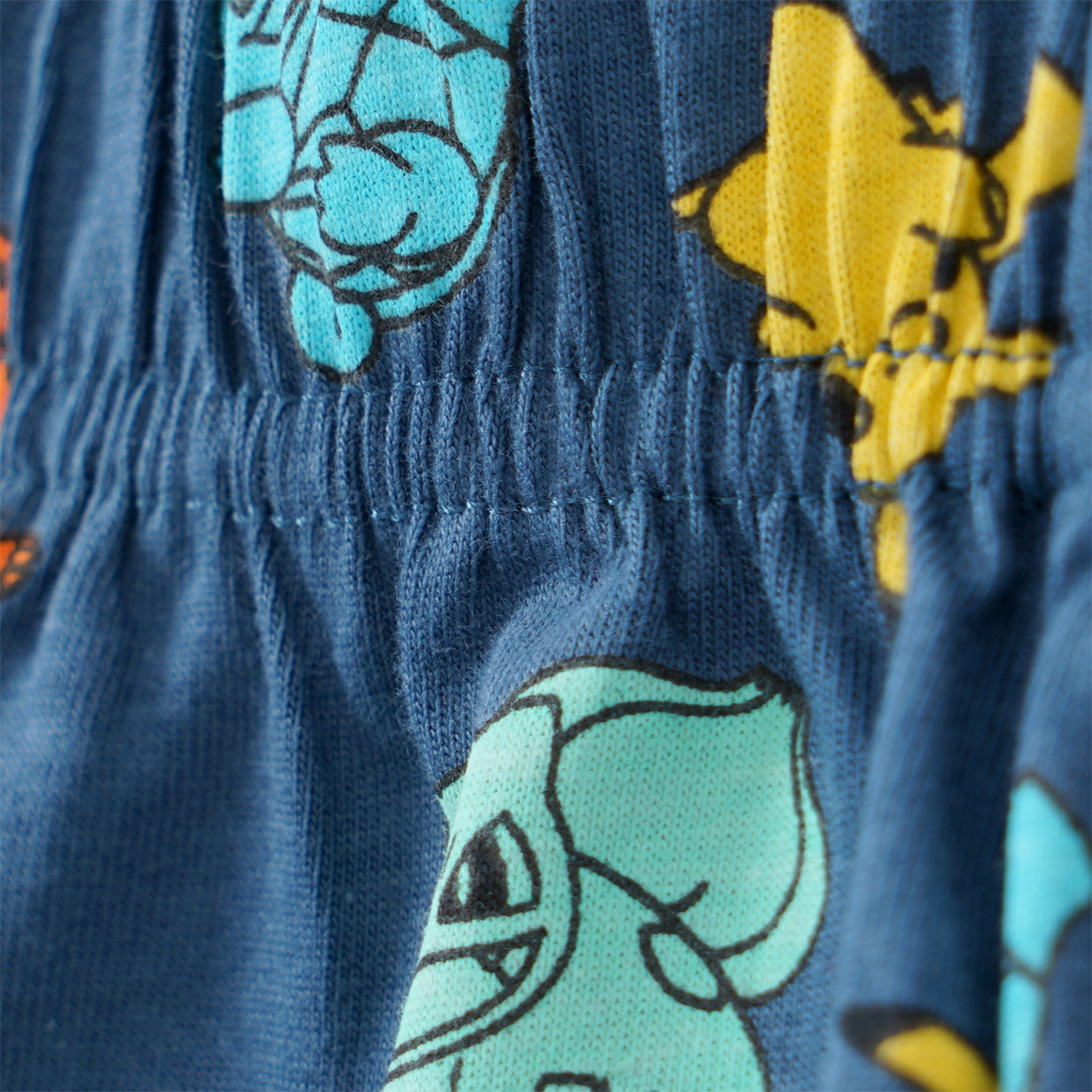Topolino Pokémon Schlafanzug mit Lizenz-Motiven dunkelblau / gelb