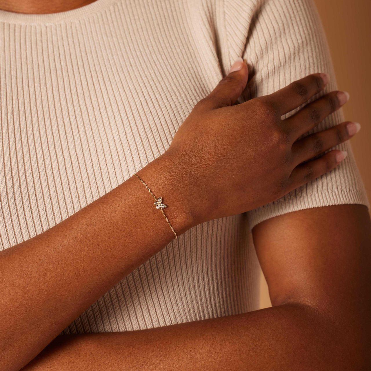 Zilveren goldplated armband vlinder zirkonia