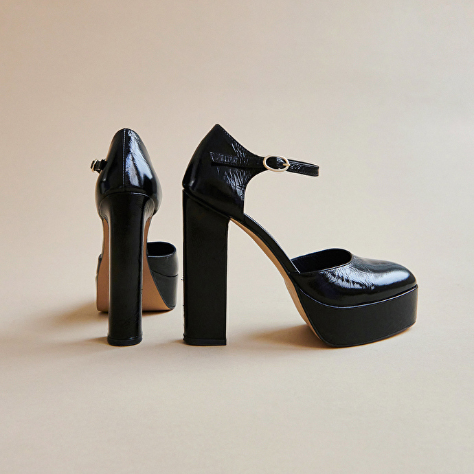 Salomés à talons et plateformes  en cuir brillant noir