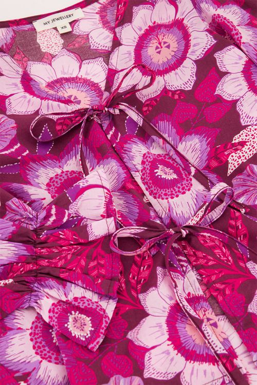 Bruine top met strikjes en roze bloemenprint
