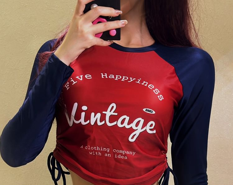 Sabbia - Set: Rashguard met lange mouwen, tekst en trekkoord + effen bikinibroekje
