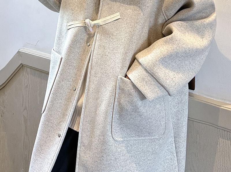 Orungeetun - Wollen trenchcoat met lange mouwen en tuimelschakelaar
