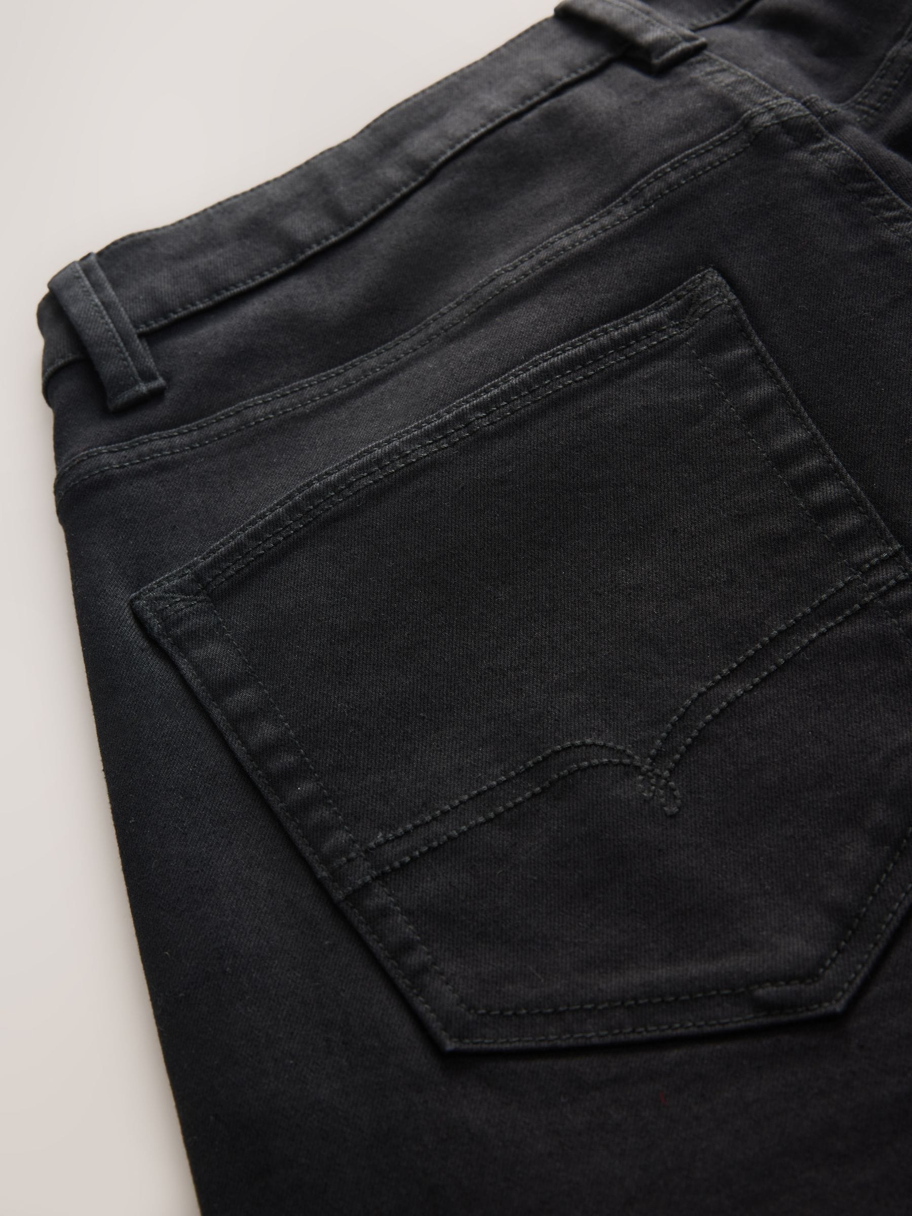 Zwart - Standaard toelopende pasvorm - Motionflex jeans