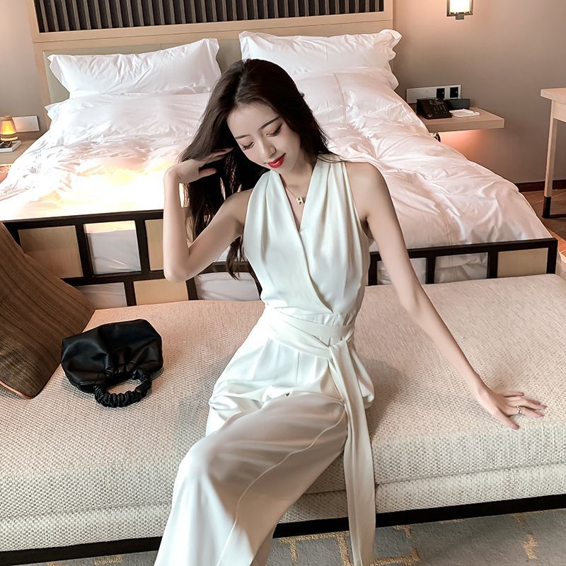 Morning Glory - Mouwloze jumpsuit met wijde pijpen