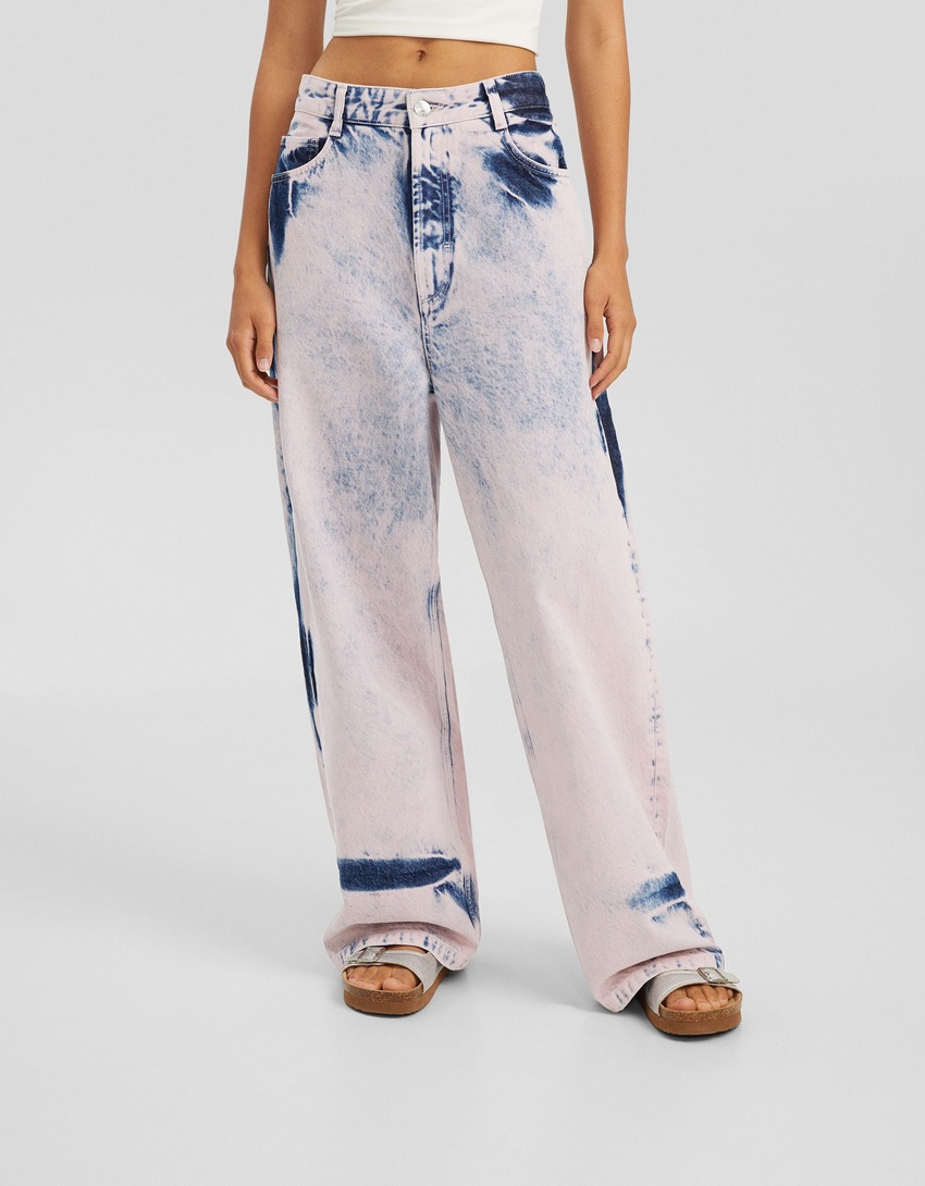 jeans super largos tingidos em excesso