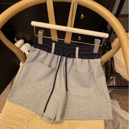 Mikiko - Tweekleurige joggingbroek met trekkoord in de taille