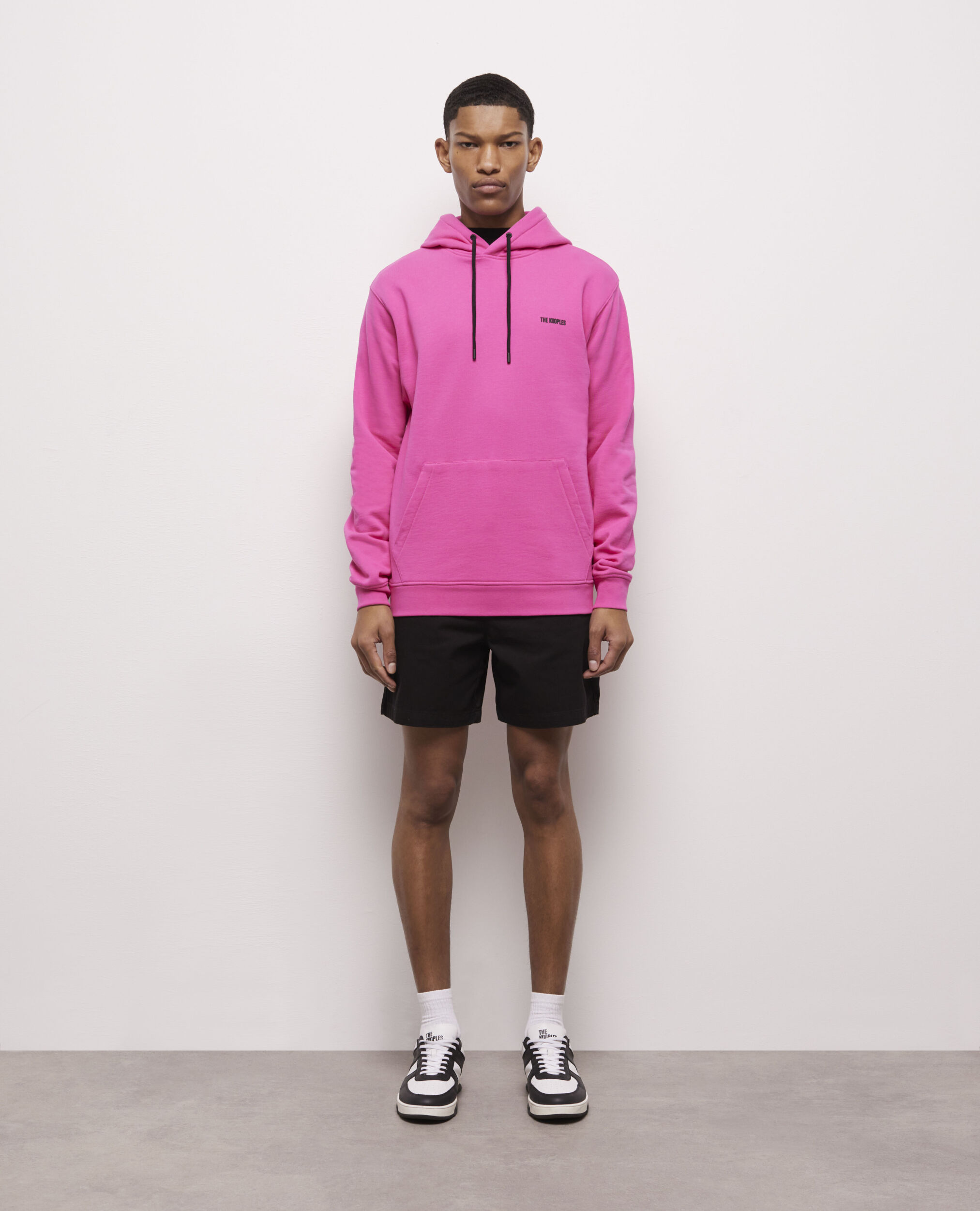 Sweatshirt à capuche rose avec logo