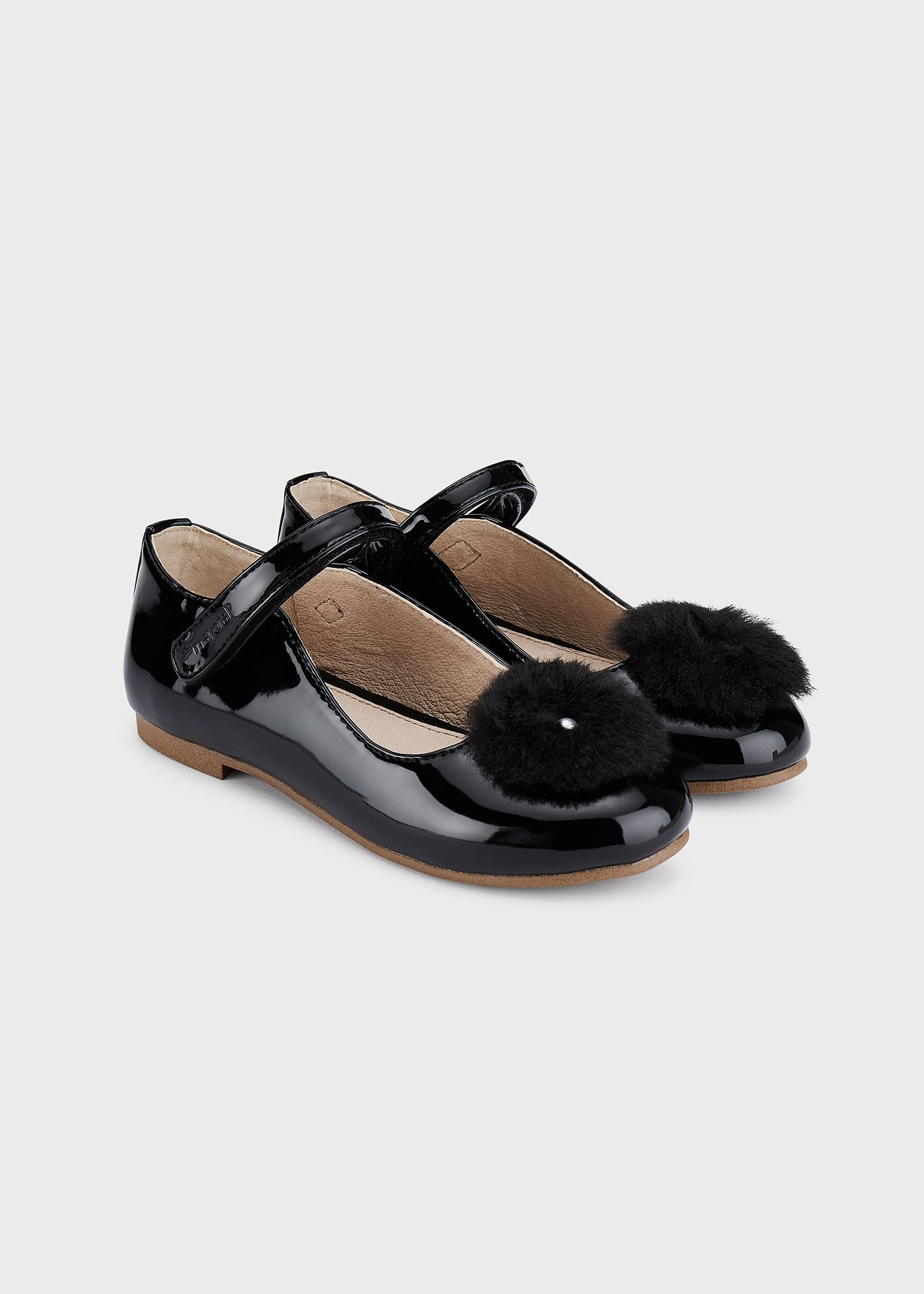 Sapato estilo Mary Jane com palmilha de pompom, em couro sustentável, para meninas.