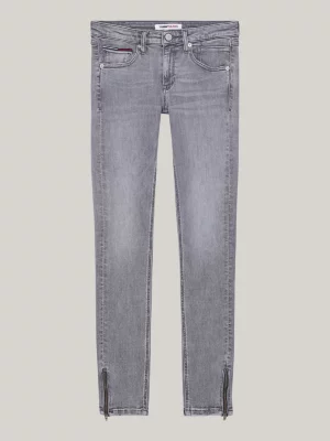 Calça jeans Scarlett de cintura baixa, corte skinny e zíper no tornozelo.