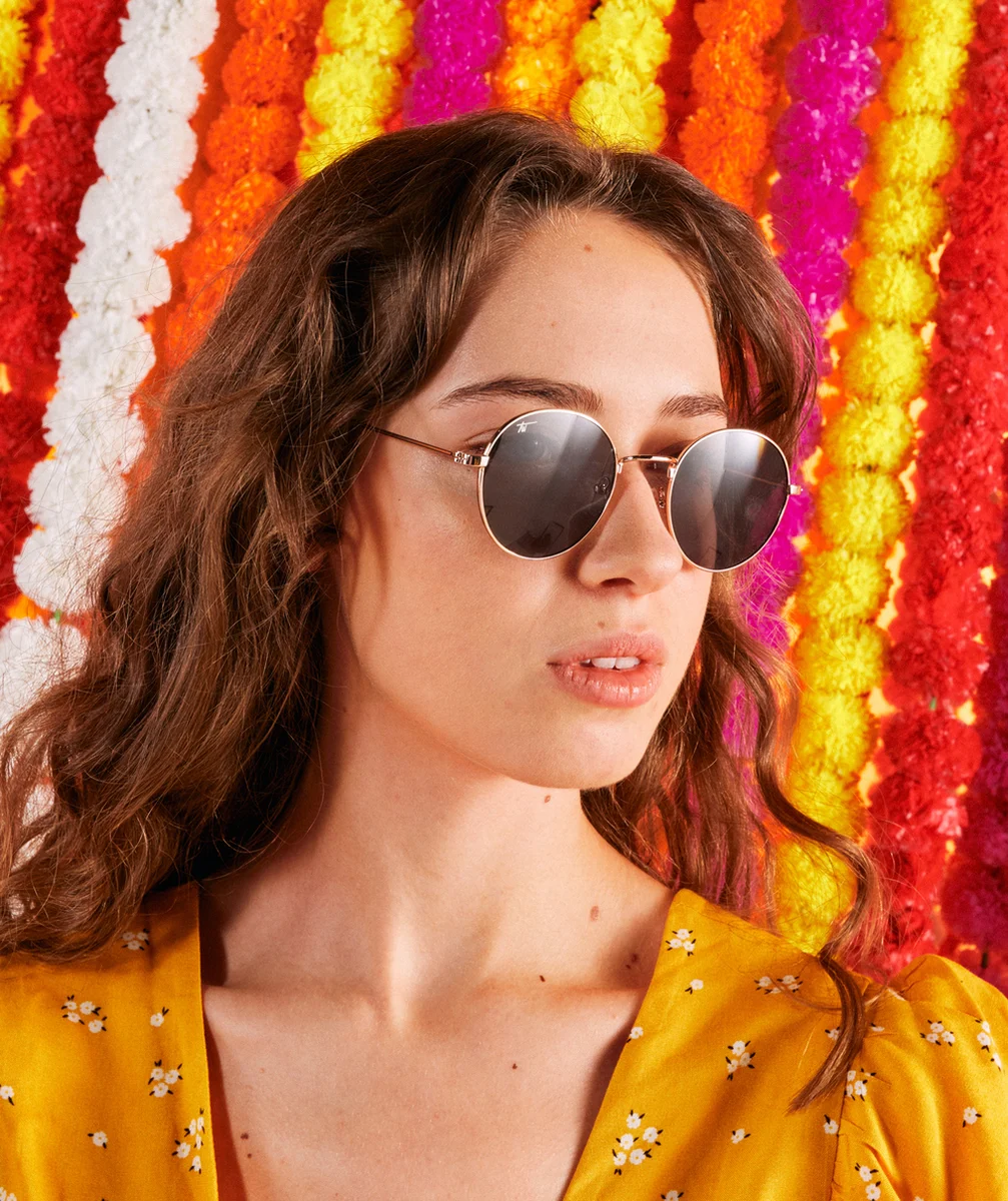 LA PAIRE DE LUNETTES MÉTAL COULEUR DORÉE FORME RONDE