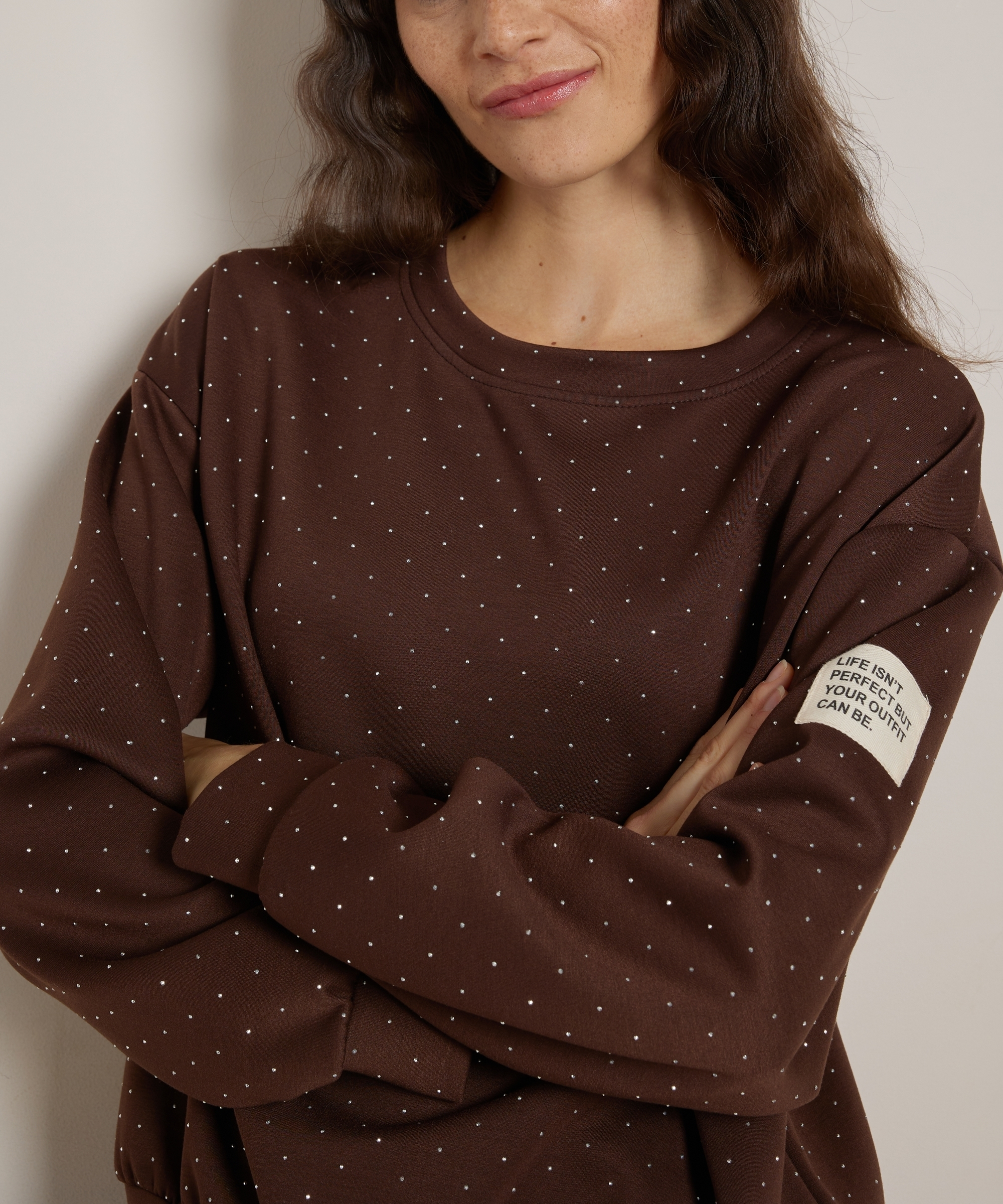 glitter trui mouwlabel