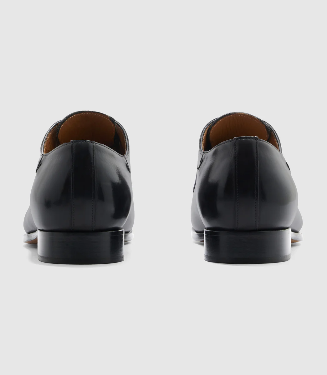 Derby couture en cuir noir 