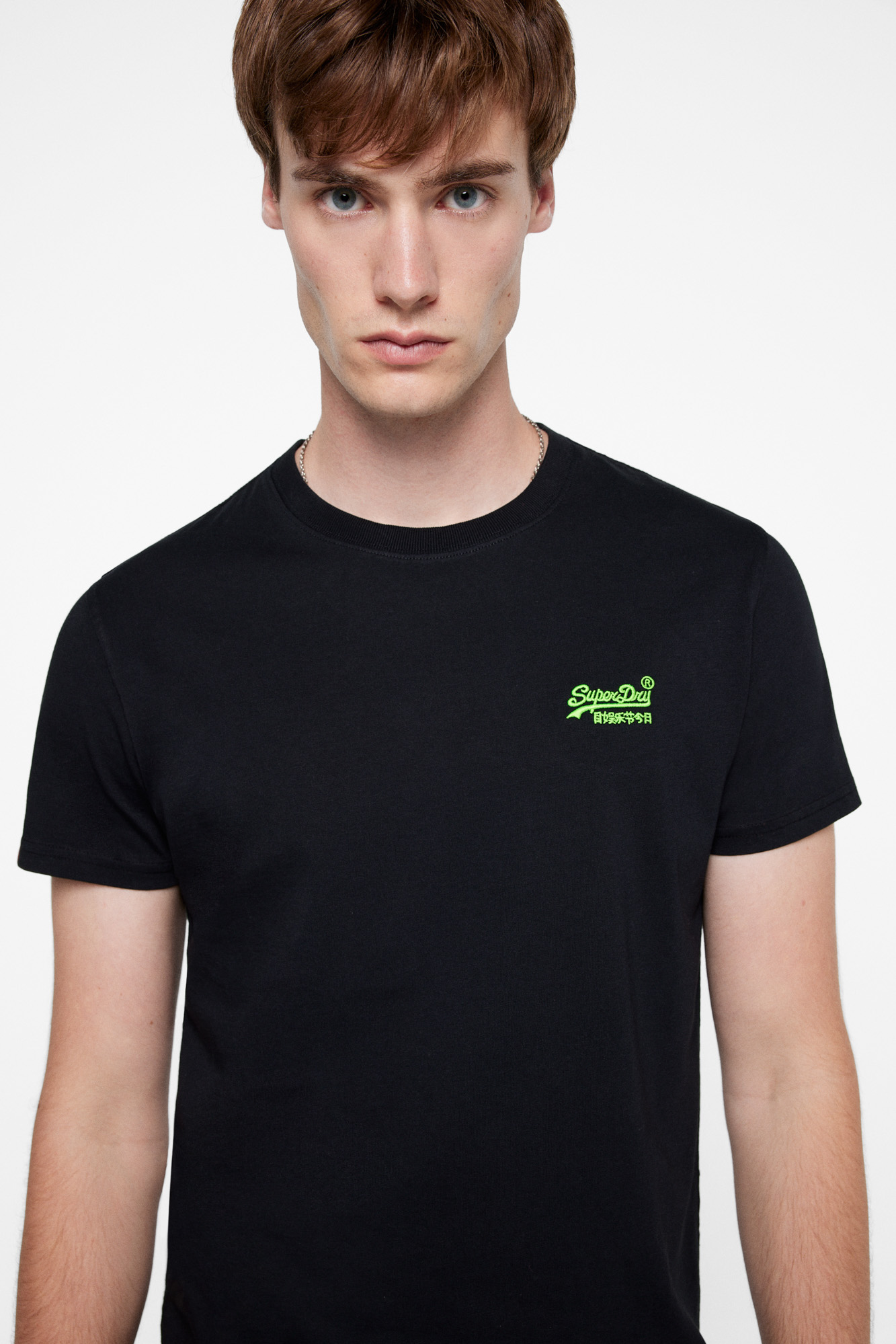 Camiseta fluorescente leve da coleção ORange™Label