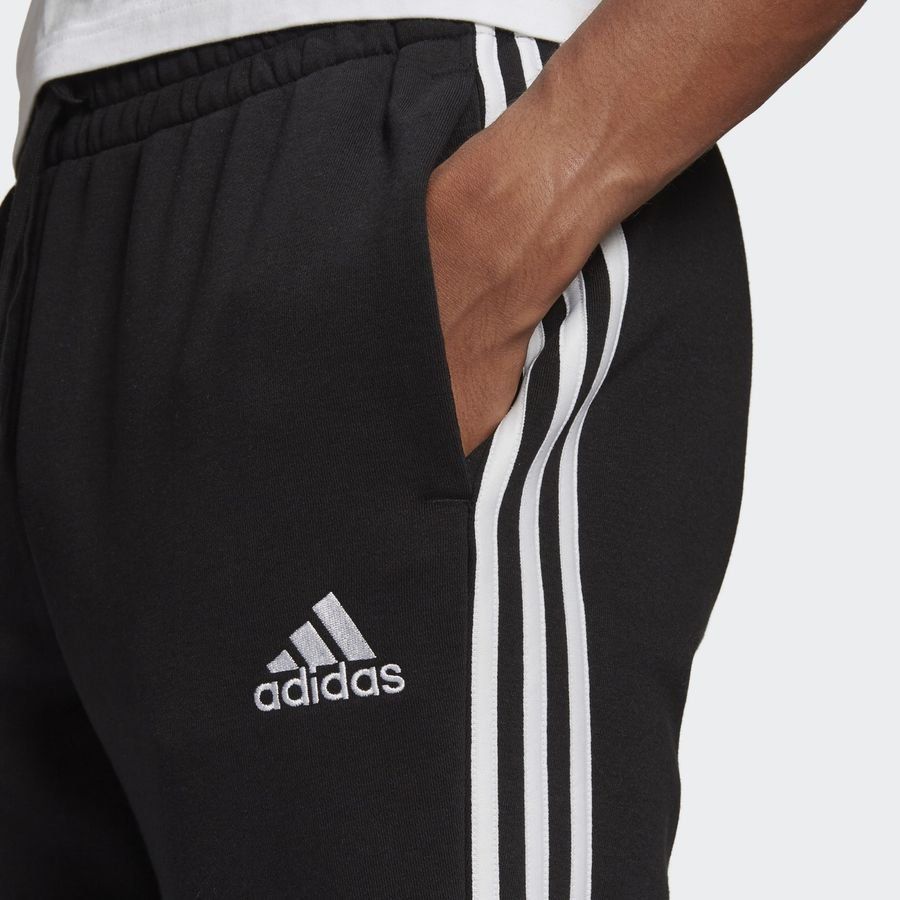 adidas Bas de Survêtement Essentials Fleece Tapered 3-Stripes - Noir/Blanc