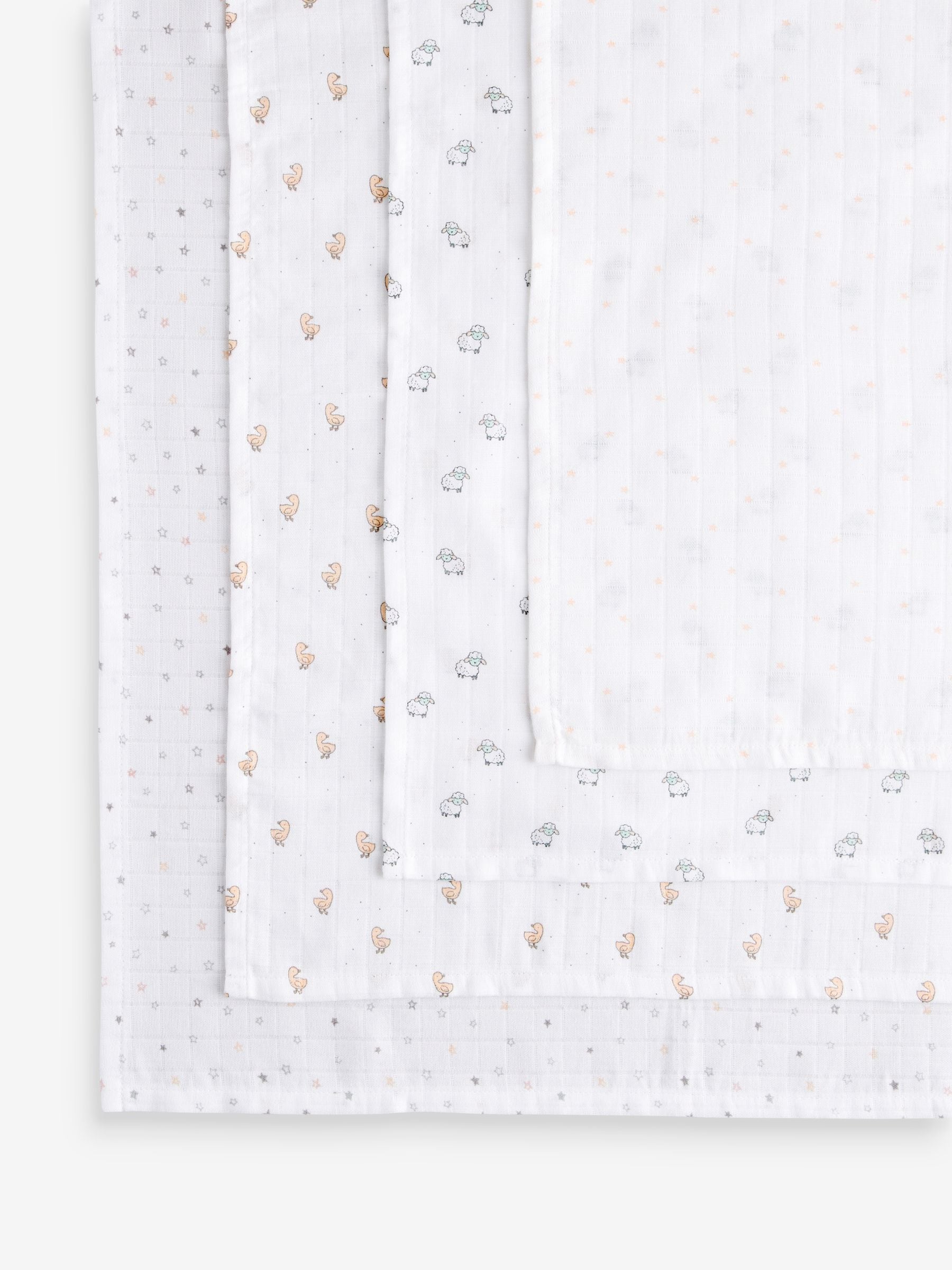 Wit met subtiele dierenprint - Set van 4 mousseline babydoekjes