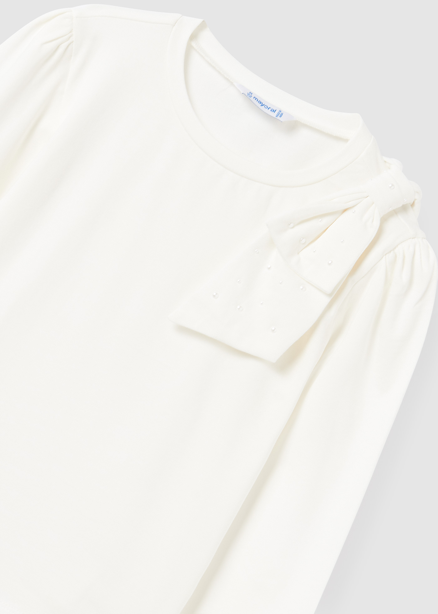 Camiseta infantil Better Cotton com laço