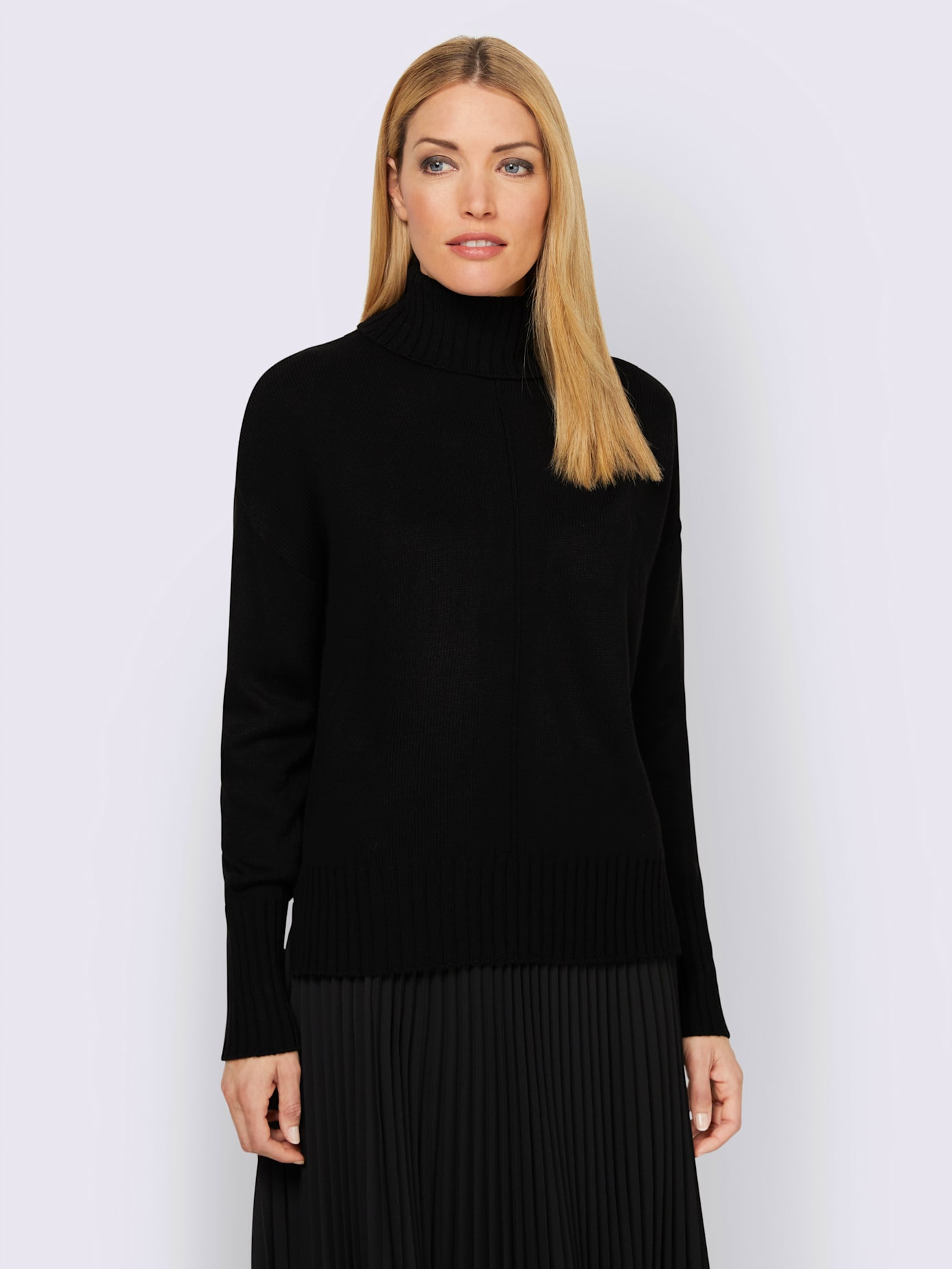 Pull col roulé flatteur
