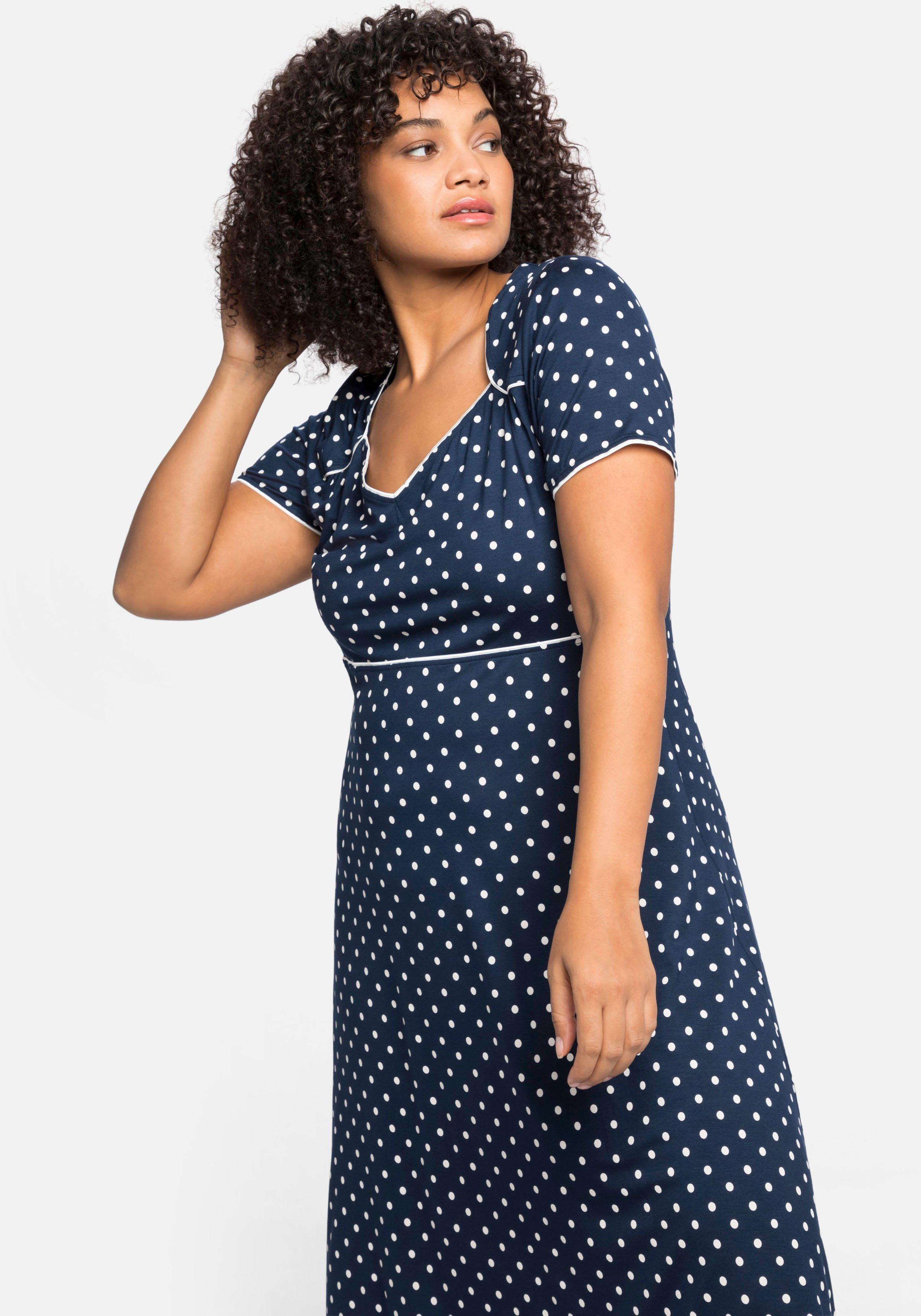 Jerseykleid mit Punktedruck und Paspelierung