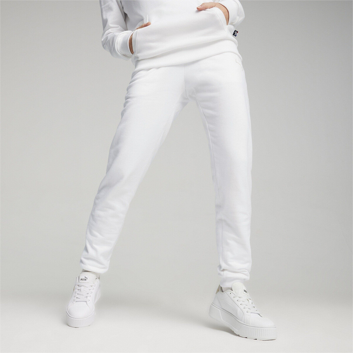 Calças unissex PUMA, fabricadas na França.