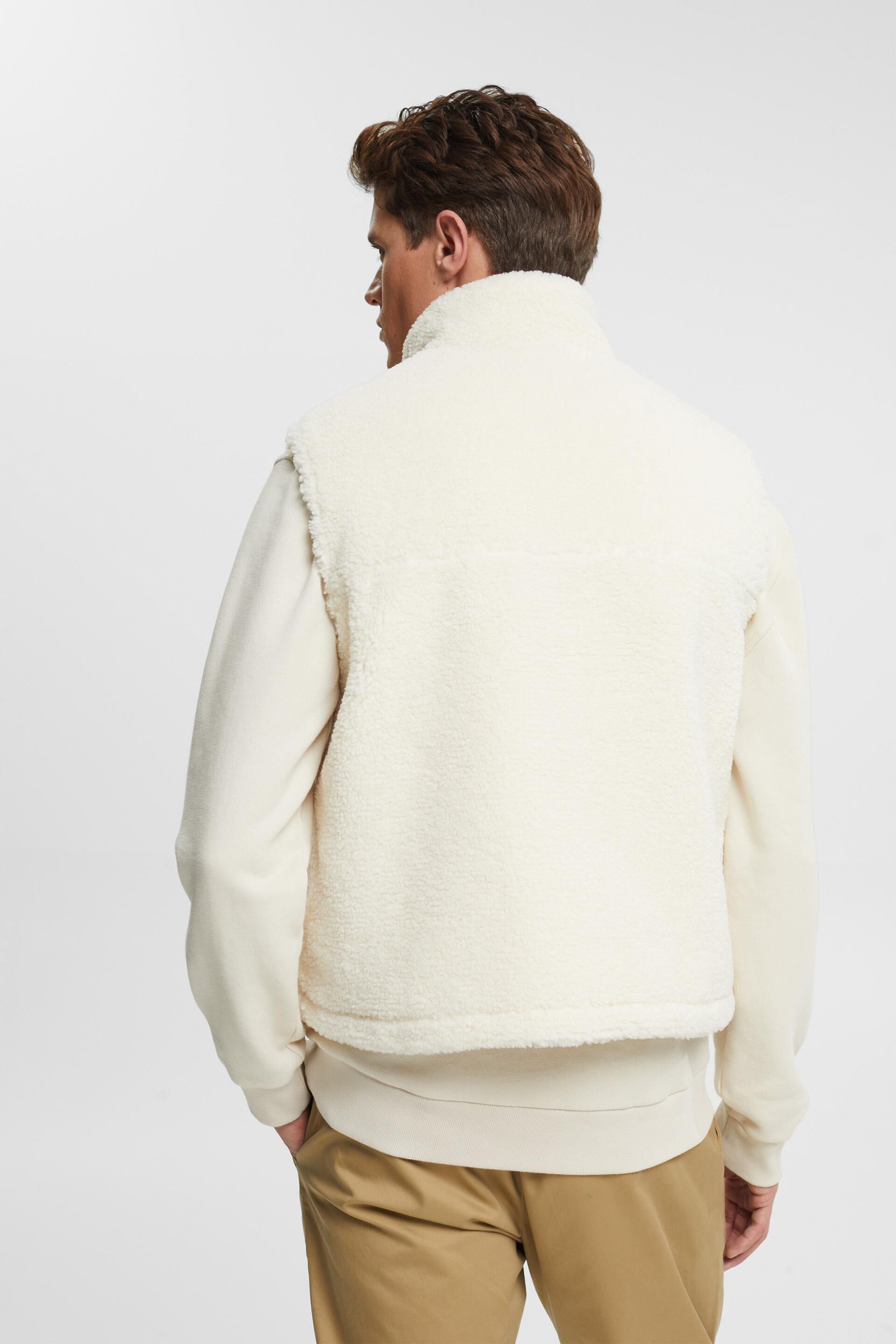 Veste sans manches en borgana d’aspect peluche ornée d’un logo brodé
