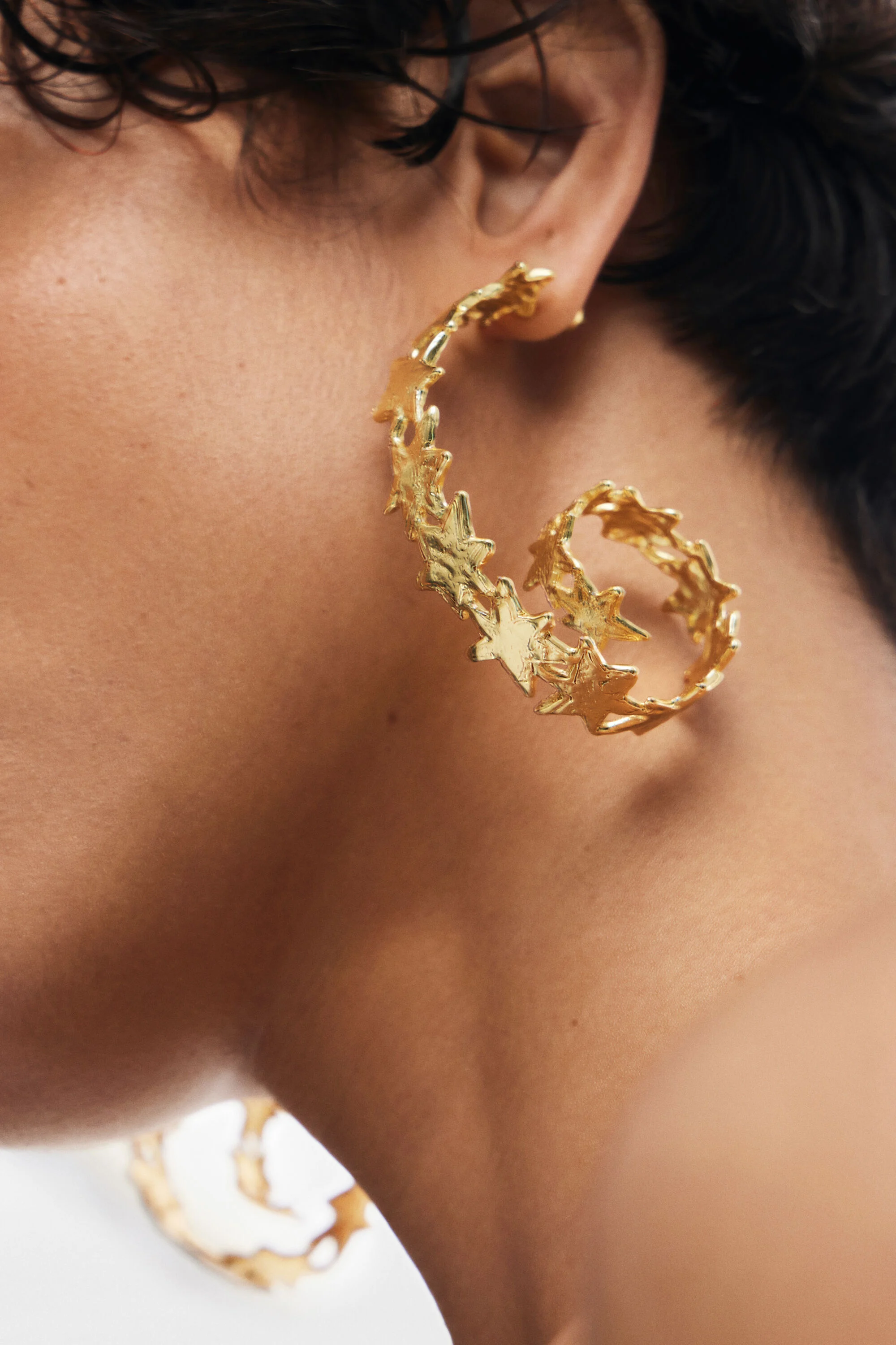 Pendientes espirais estrelas banho ouro Zalio