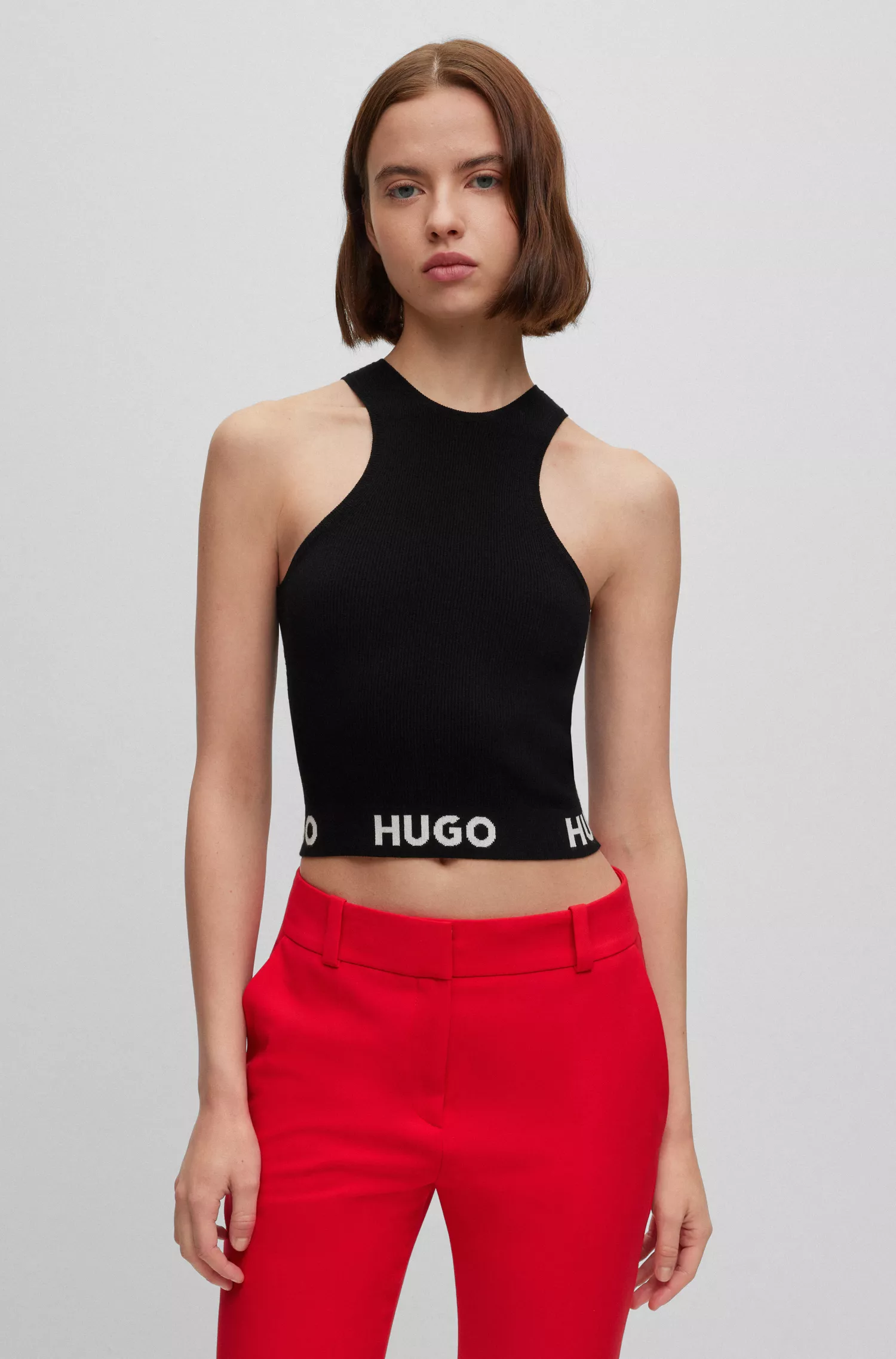 Blusa HUGO vermelha sem mangas em malha canelada com cós em jacquard com o logotipo.