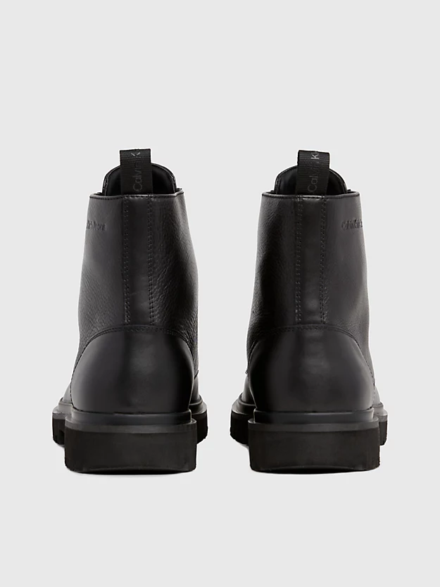 botas de couro até o tornozelo