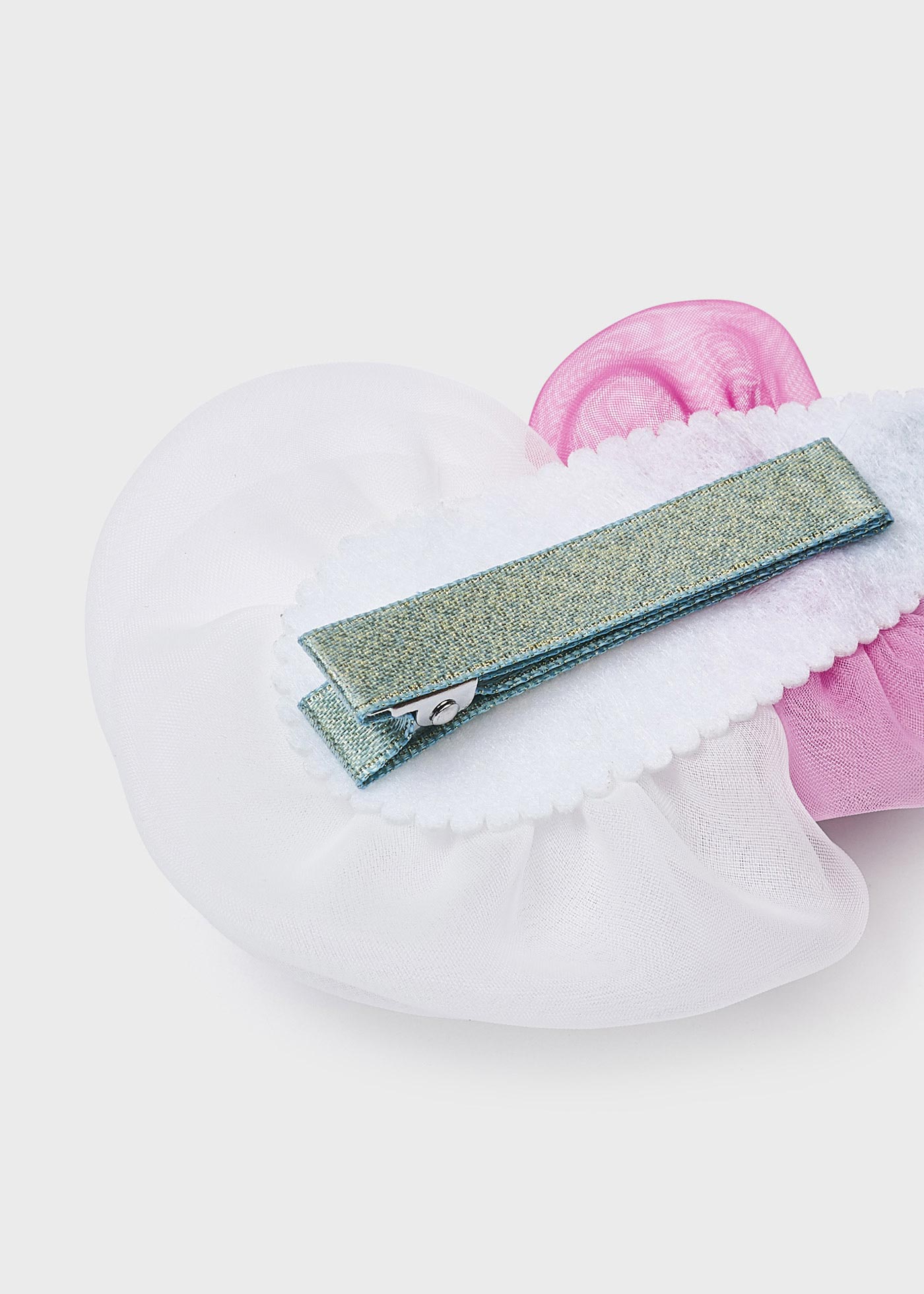 Presilha de cabelo com aplique floral para menina