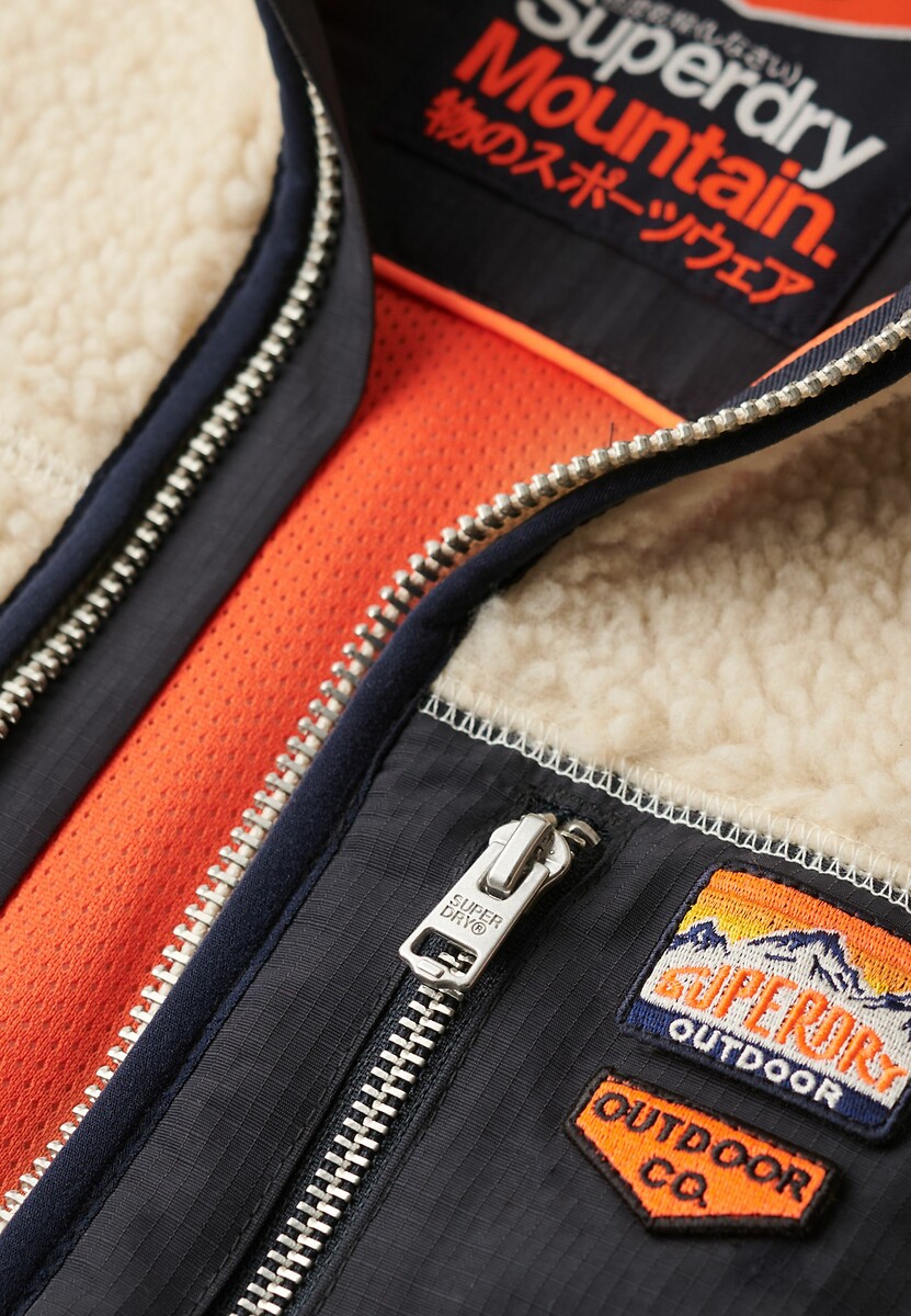 SUPERDRY<br>Lã Sherpa com zíper e bolso
