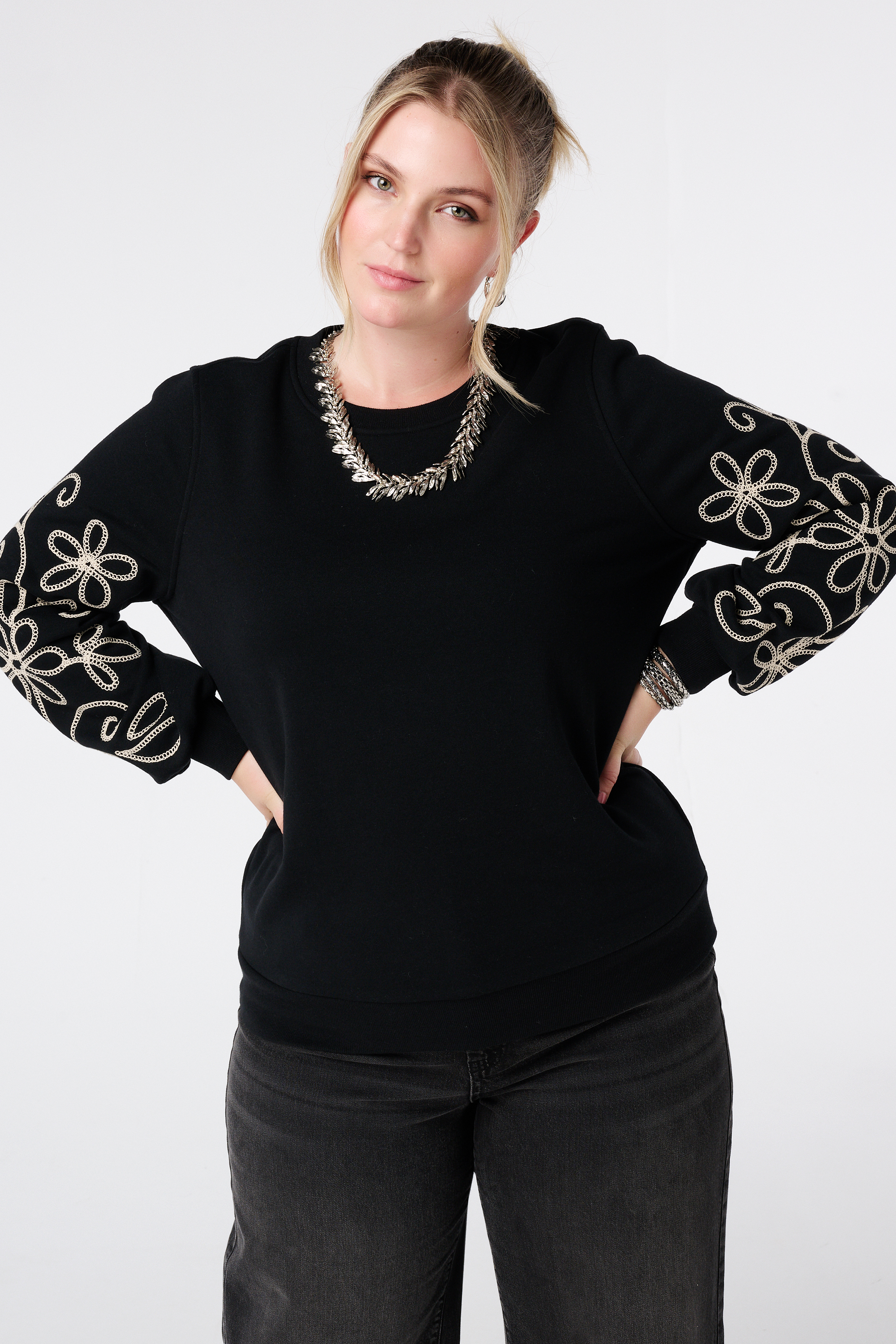 Sweater met broderie details Zwart