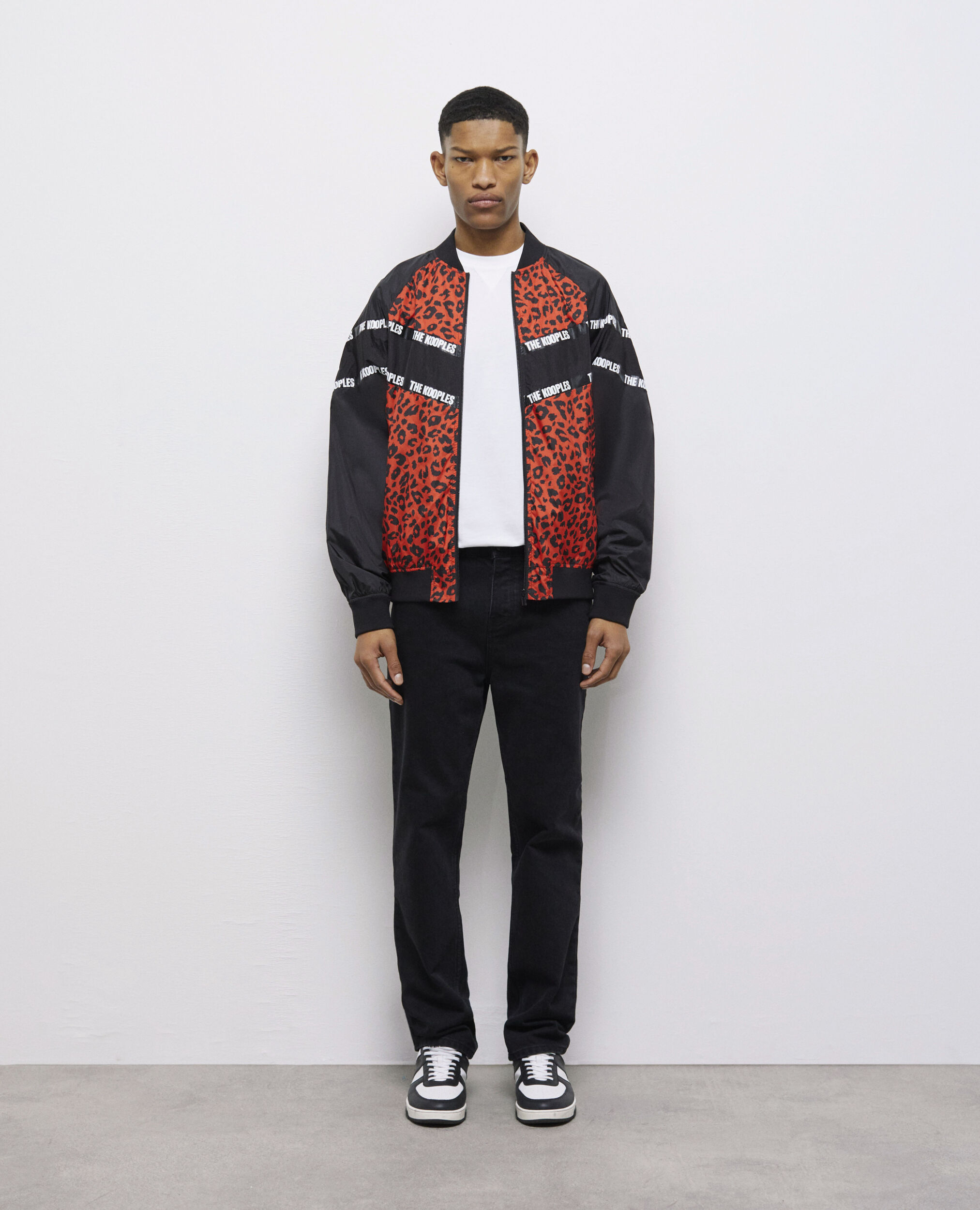 Blouson bicolore avec bandes logo