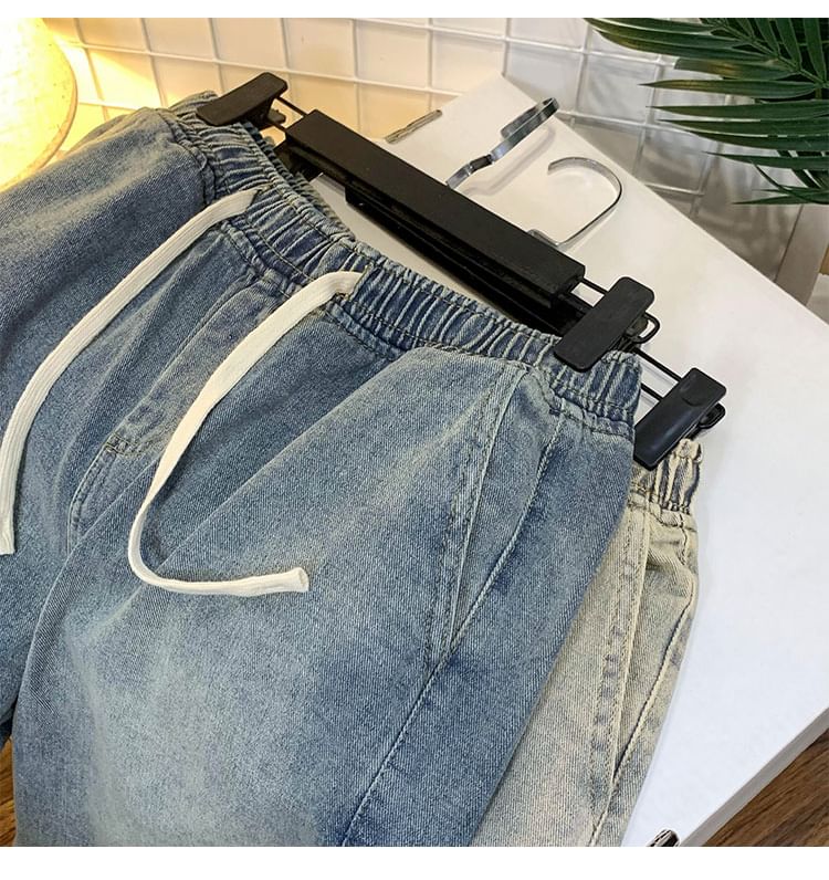 Kimeya - Gewassen denim shorts met wijde pijpen en trekkoord in de taille