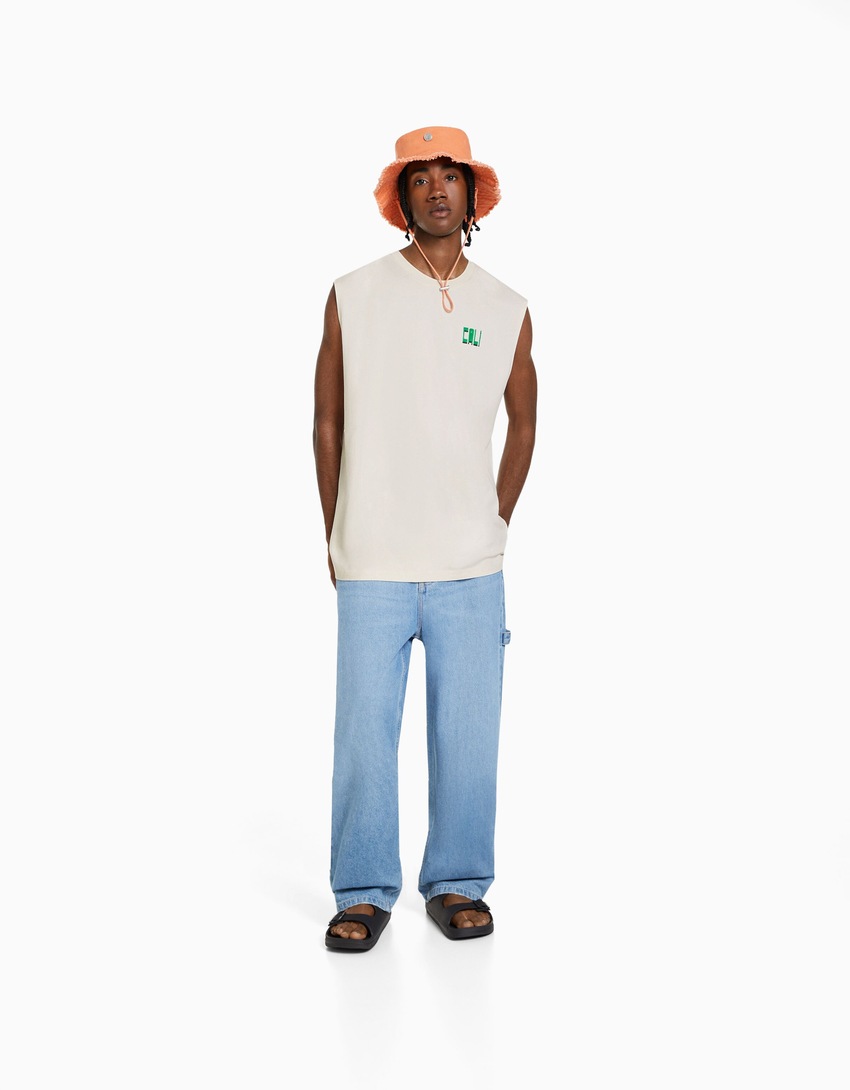 Blusa sem mangas com estampa operária