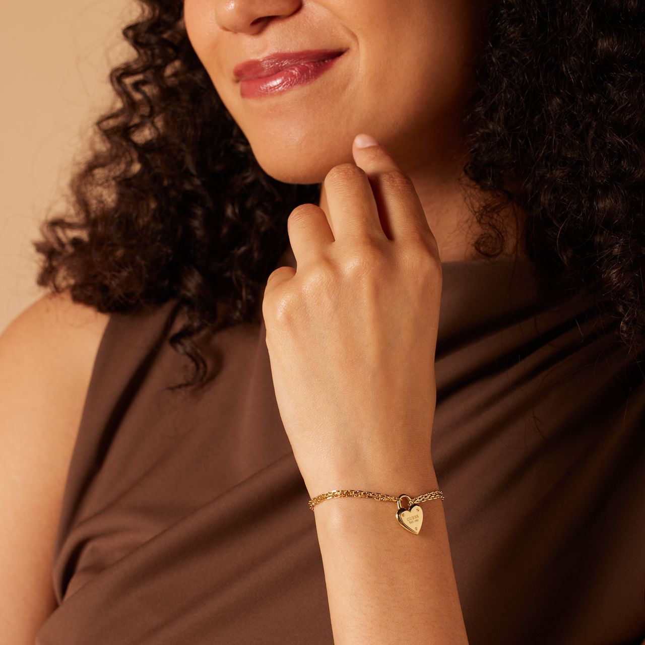 Guess stalen goldplated armband ALL YOU NEED IS LOVE