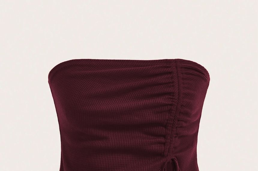 Asiris - Strapless asymmetrische, effen crop top