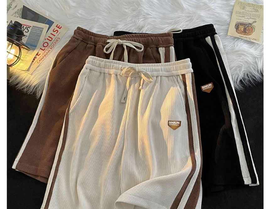 Femilina - Gestreepte joggingbroek met trekkoordtaille