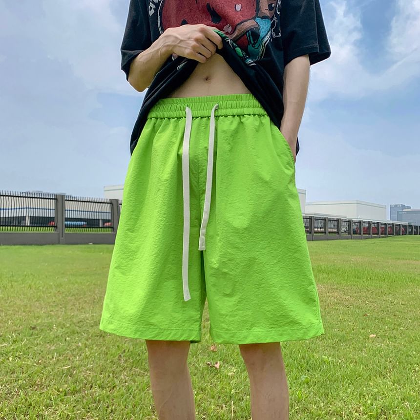 Giuliana - Effen strandshort met trekkoordtaille