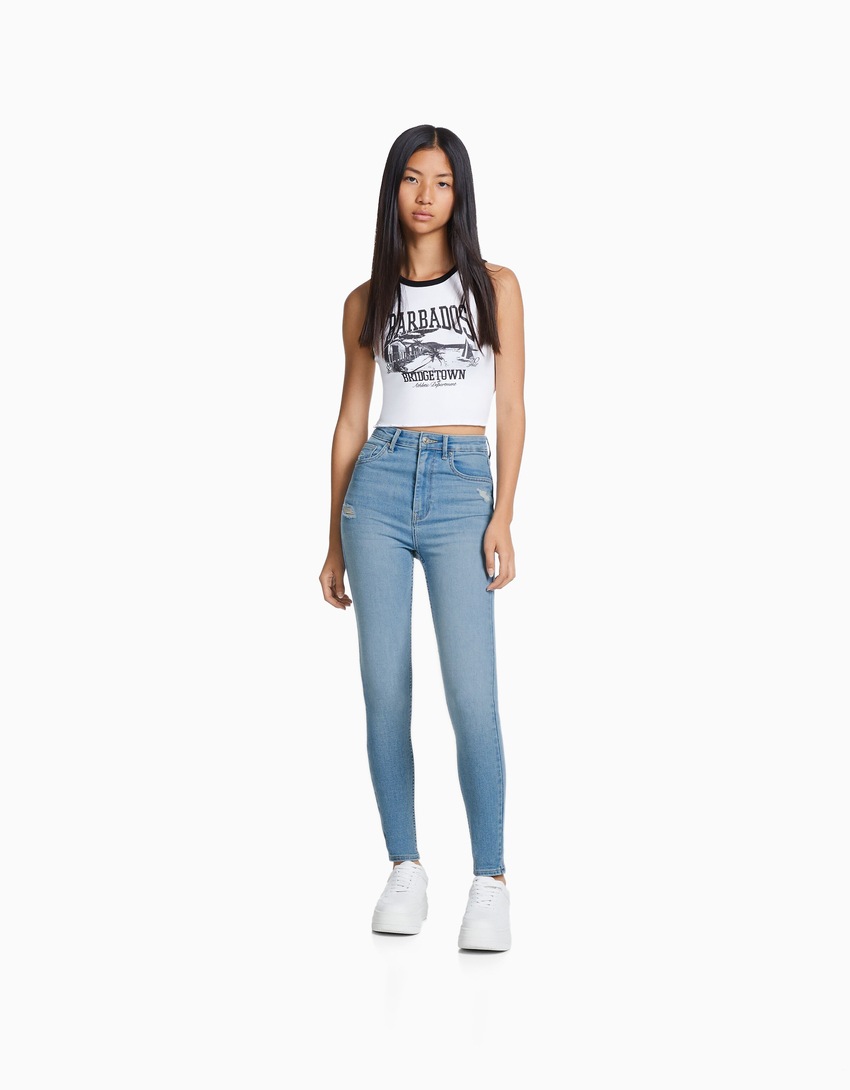 calça jeans skinny de cintura super alta