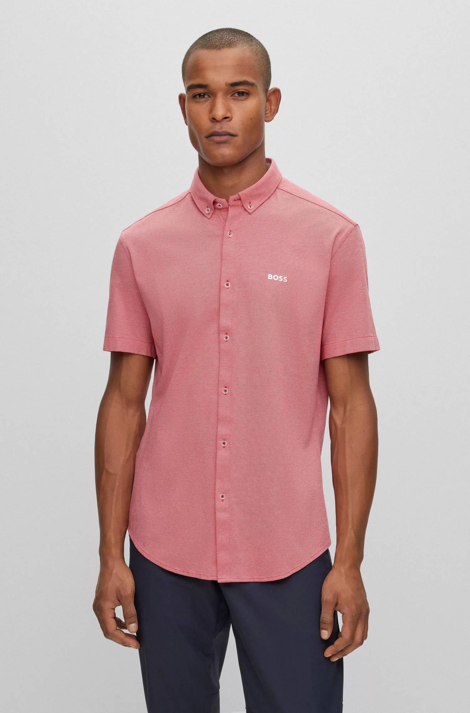 Camisa BOSS verde de botões, corte regular, em malha de algodão puro.
