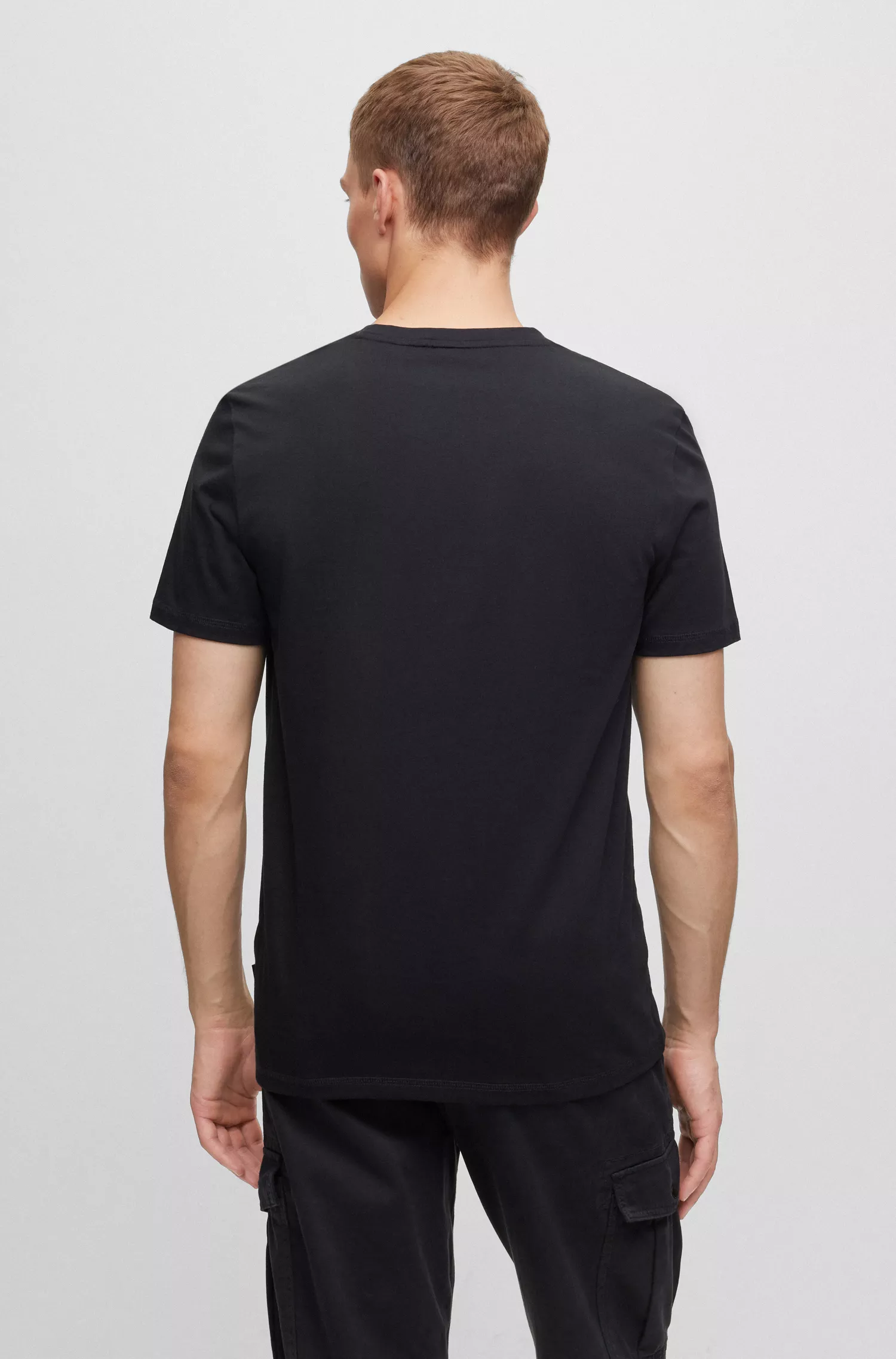Camiseta BOSS laranja, corte regular, em malha de algodão com estampa da coleção.