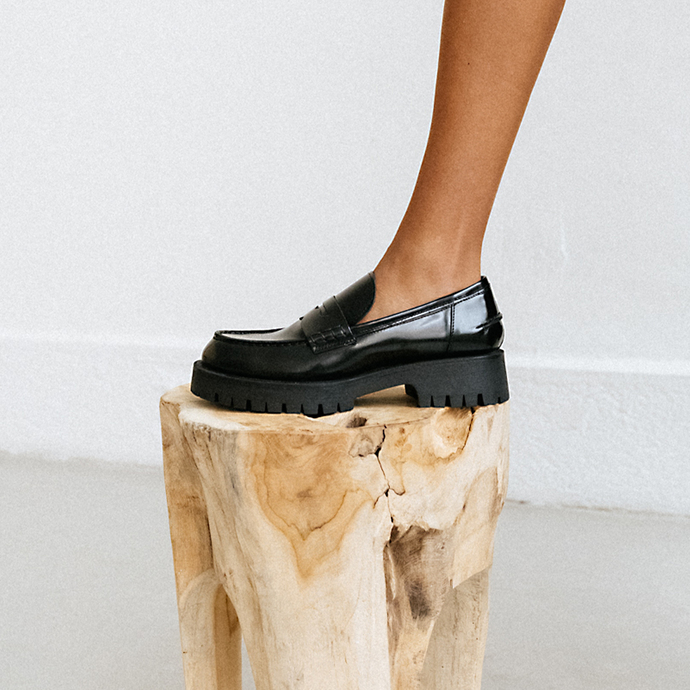 Mocassins à semelles crantées  en cuir glacé noir