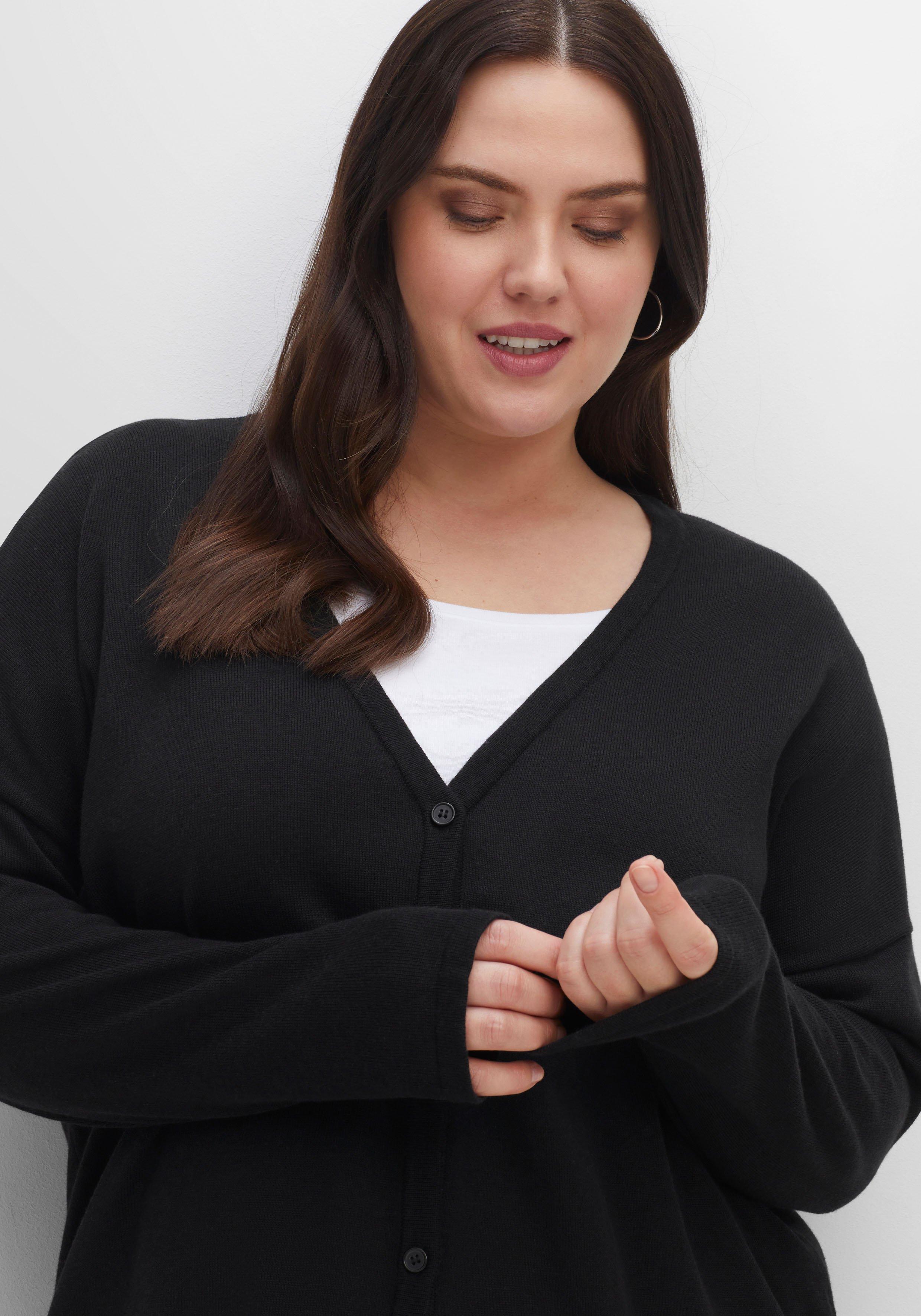 Strickjacke mit V-Ausschnitt und gerundetem Saum