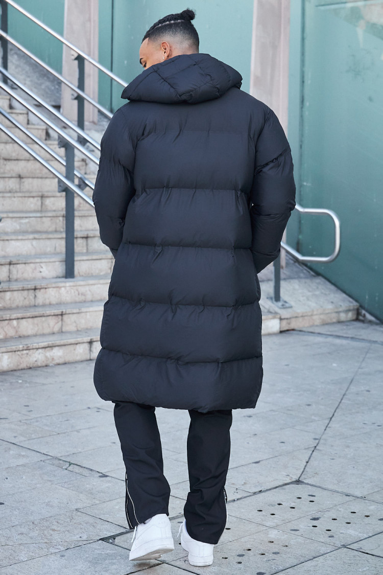 Doudoune matelassée longue noir à capuche