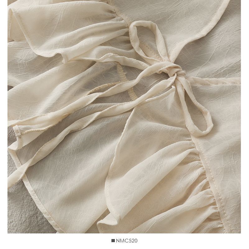 Lemongrass - Chiffon vest met strikceintuur en ballonmouwen
