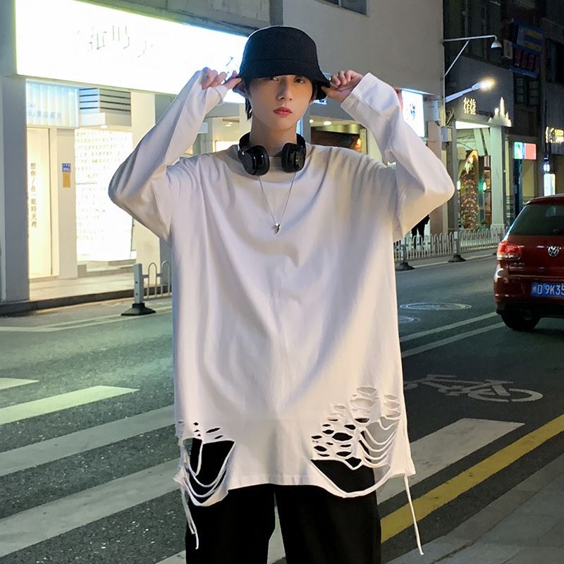 Whyessa - Versleten oversized top met lange mouwen