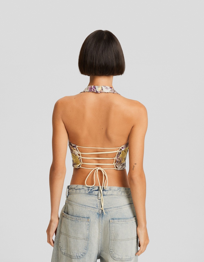 Blusa aberta nas costas com amarração em jacquard