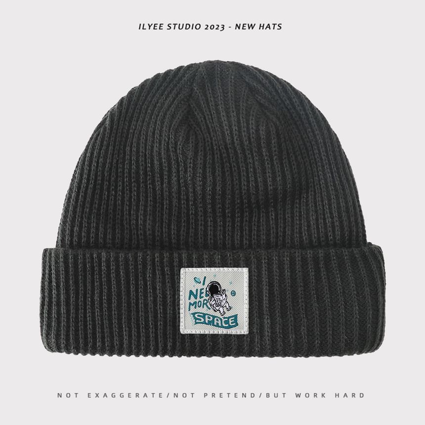 Uweiifame - Effen muts met appliqué
