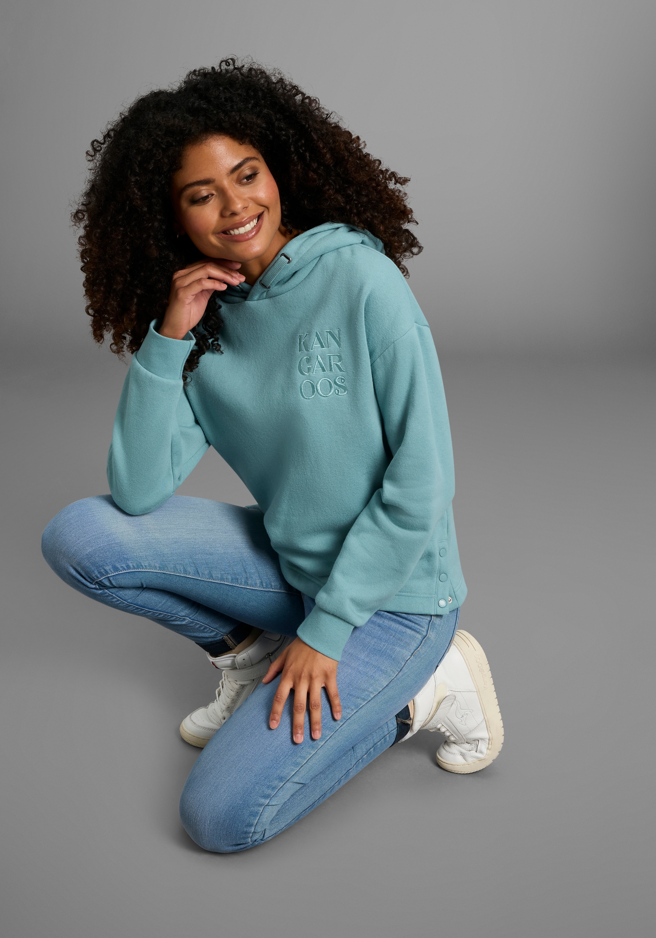 KangaROOS Kapuzensweatshirt , mit Druckknöpfen am Saum